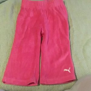 A pair of velour pull up pants size 12 months
